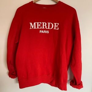 DEPARTURE - Merde sweatshirt in red. large